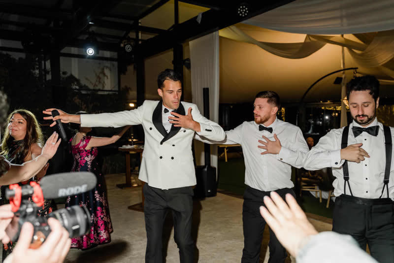 Vova and wedding guests dancing at Nuray and Adam's celebration