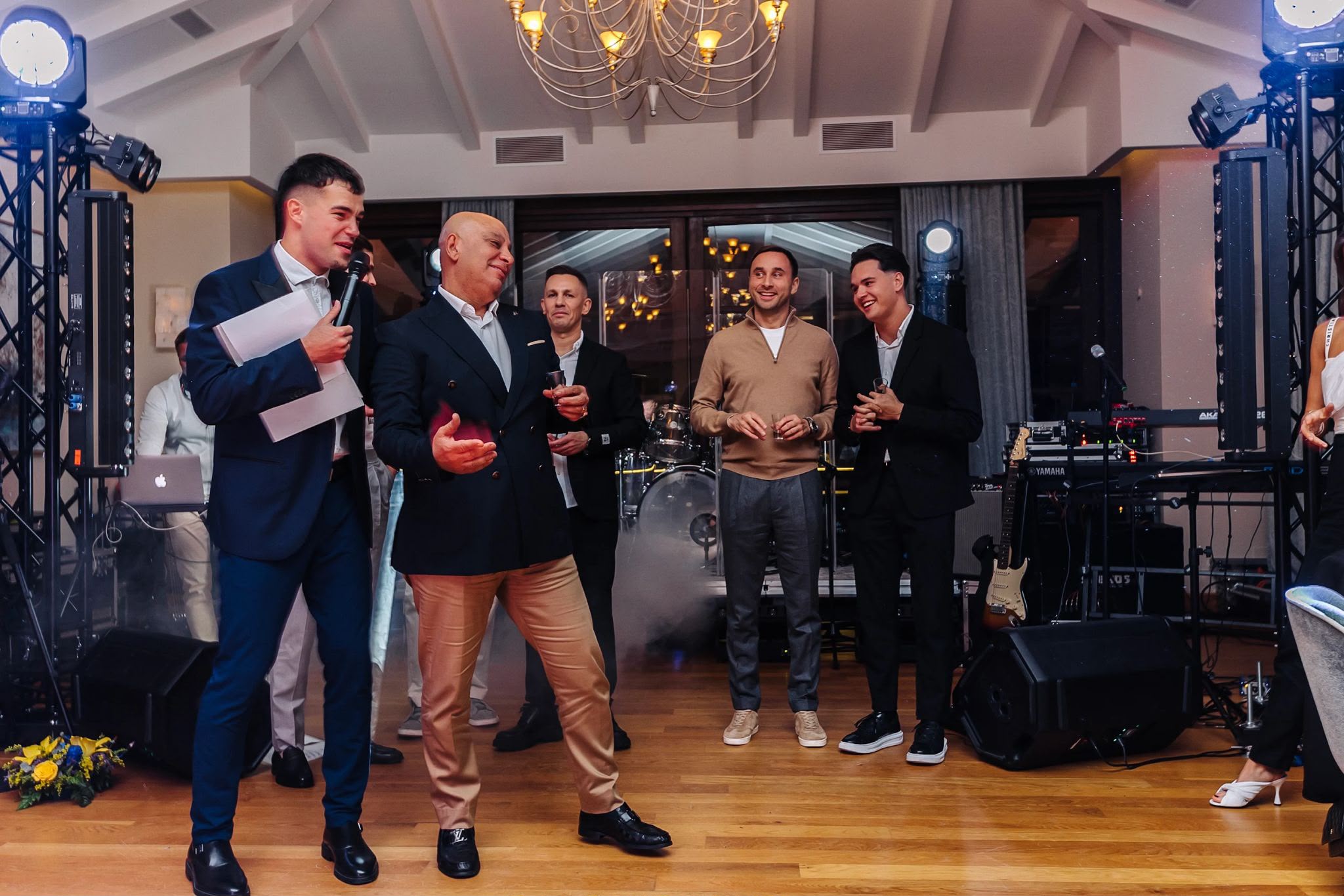 Vova hosting games with guests at a 60th birthday in Benahavís