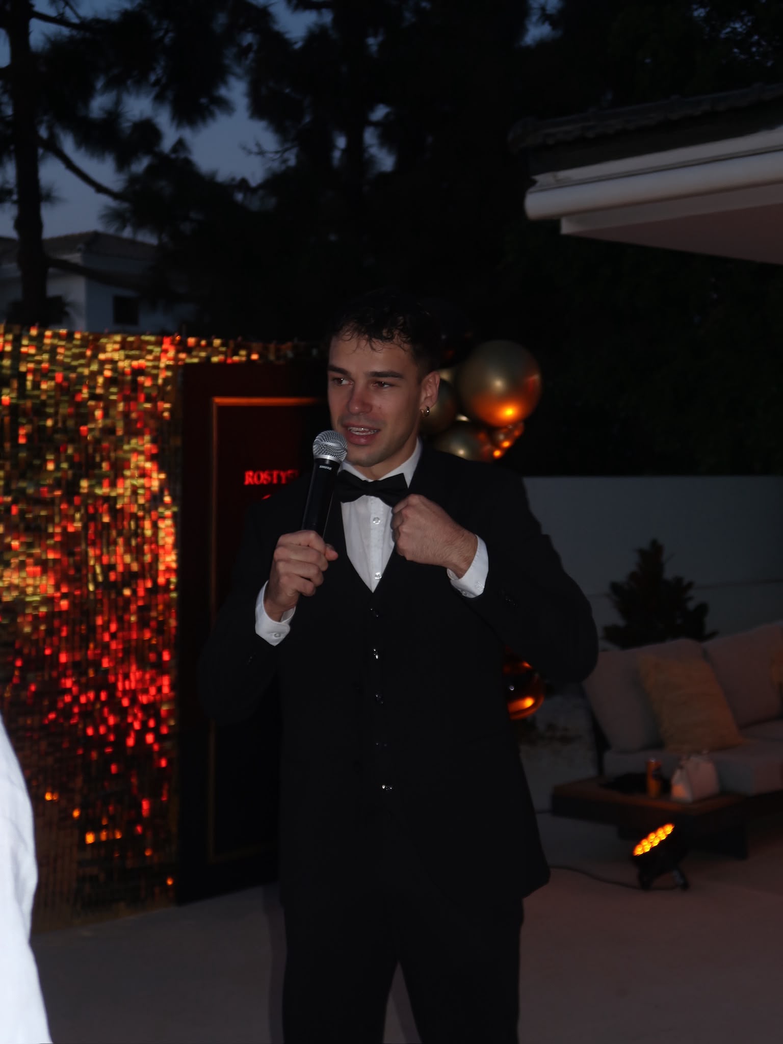 Vova speaking during the private-villa birthday celebration